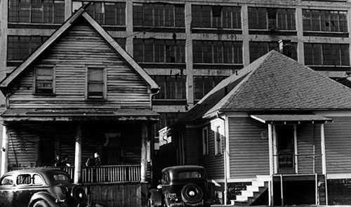 Two vacant properties in Detroit, old and somewhat dilapidated